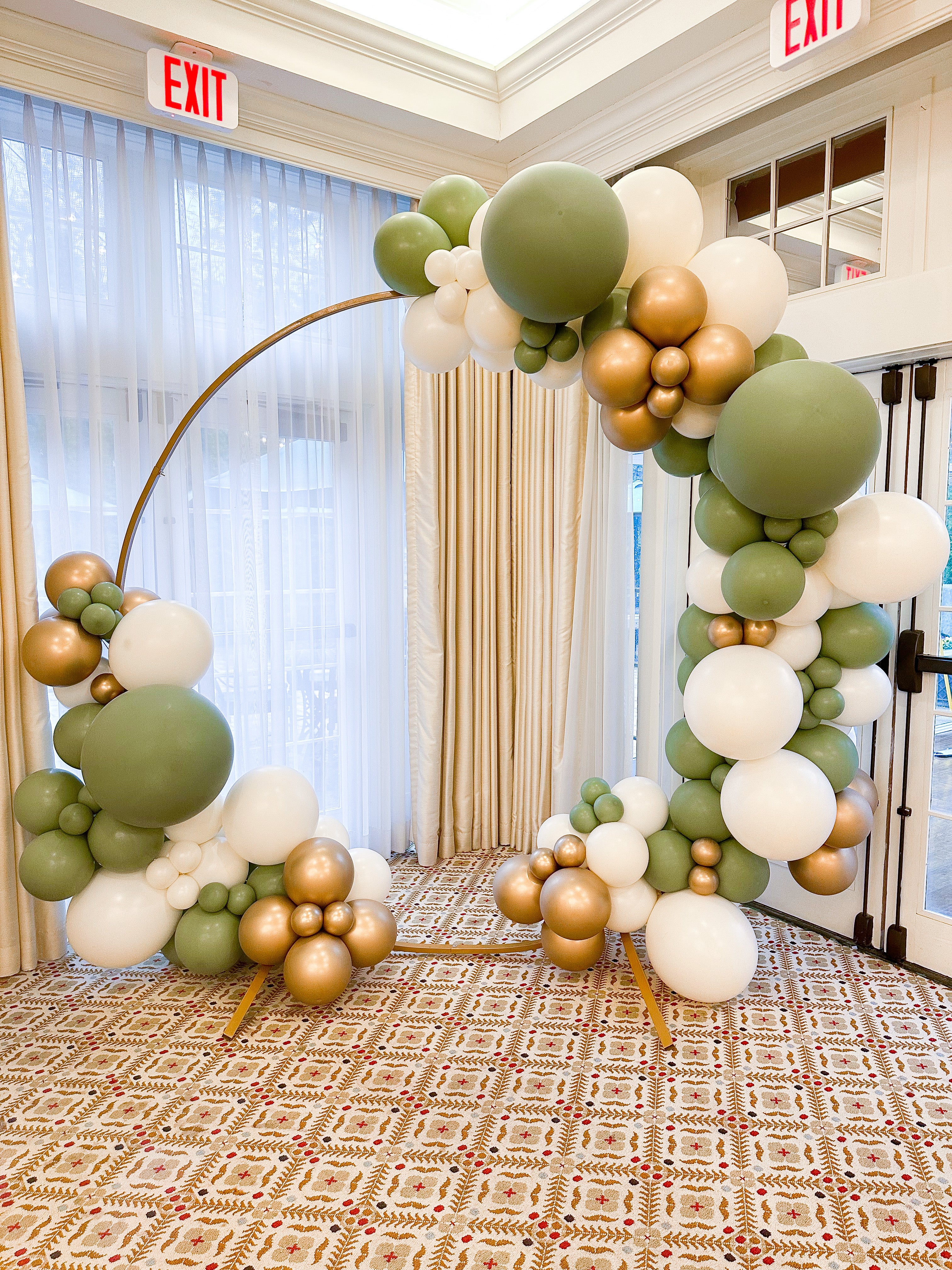 balloon garland on gold hoop at an event in avon, ct.