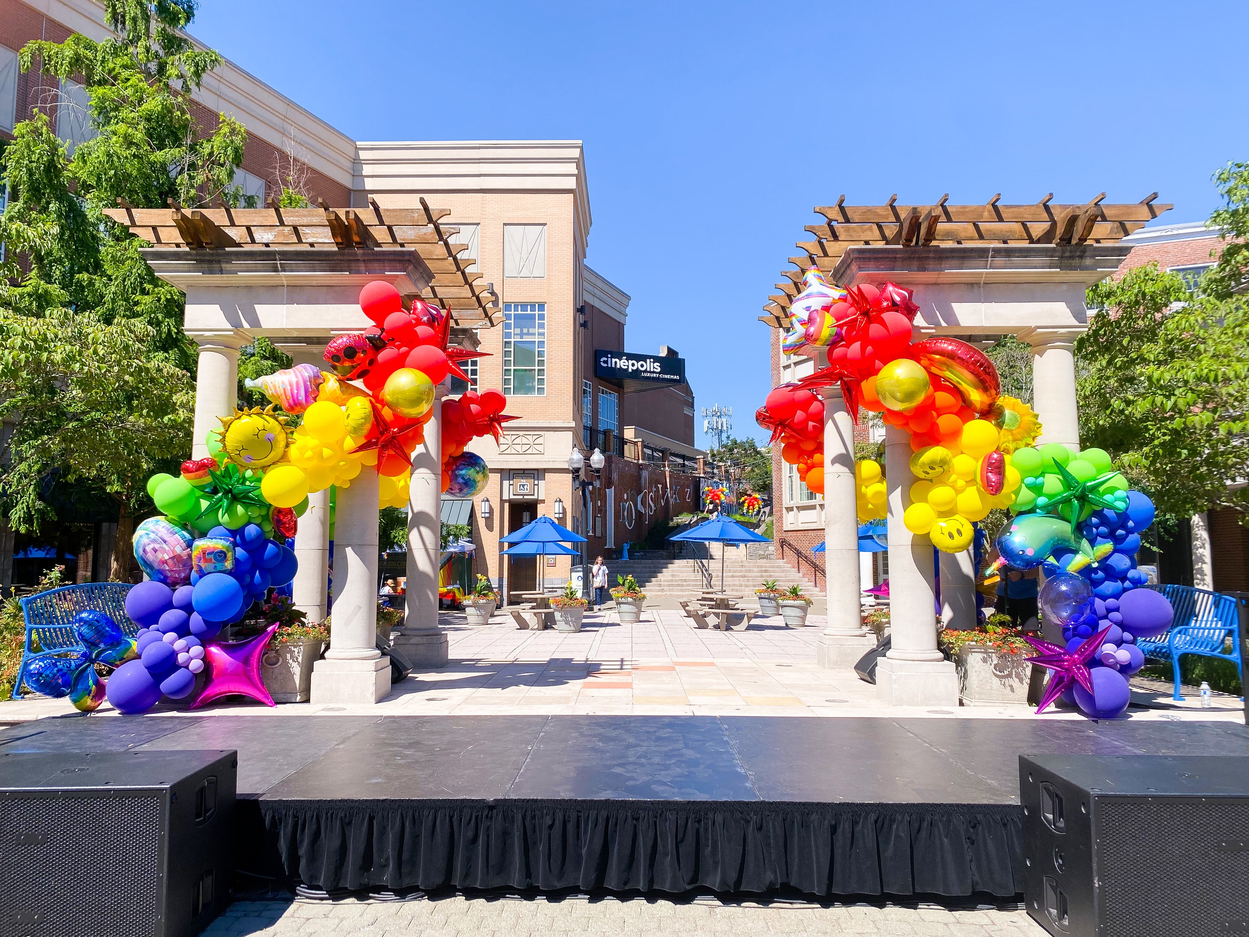 pride balloons in blue back square in west hartford connecticut, rainbow balloon garland