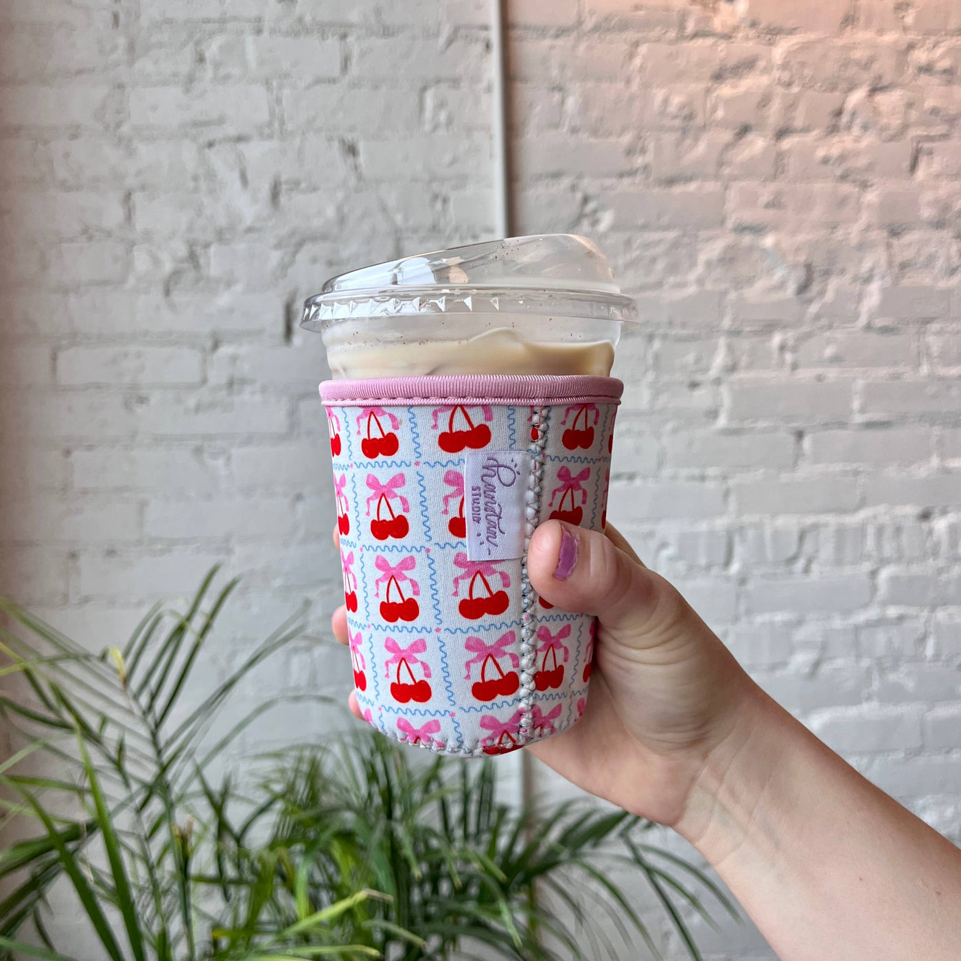 Bow Cherry Coffee Sleeve