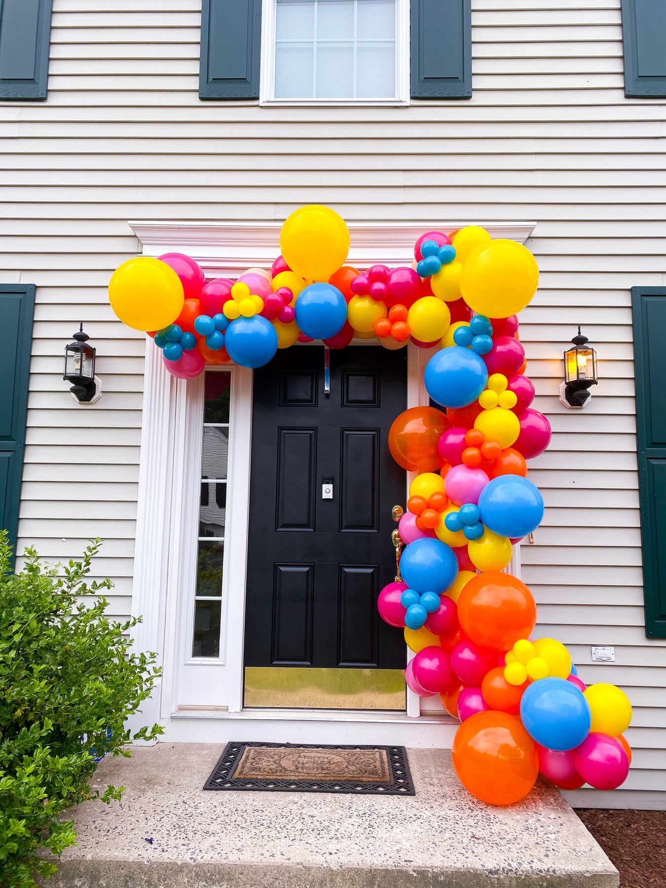 balloon garland in summer colors outside a home in avon connecticut, balloon arch, balloon decor