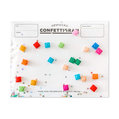 A confettigram birthday card with small Lego bricks as the confetti