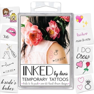 Bride to be tattoo pack containing an assortment of bridal tattoos showing hearts, ring, and the text 'team bride' applied to a bridesmaids shoulder