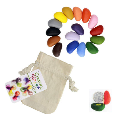 Crayon Rocks in all the colors of the rainbow with a beige muslin storage bag. Image also shows a size comparison of the crayon rocks against an American quarter.