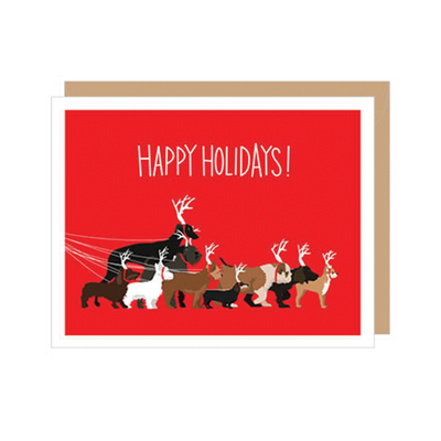 Happy Holidays Dog Greeting Card - A red holiday greeting card with the words 'happy holidays' on top and an image of a bunch of different breeds of dogs wearing reindeer antlers