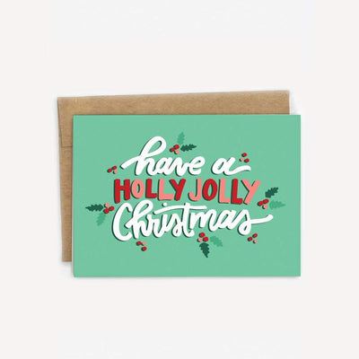 Have a holly jolly Christmas greeting card - this green greeting card with images of mistletoe and the words 'have a holly jolly Christmas' is accompanied by a Kraft paper envelope