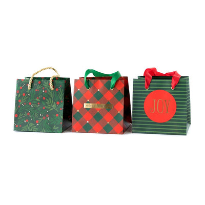 Holly mini gift bags in three different holiday designs sure to bring Christmas cheer to all those who receive them.