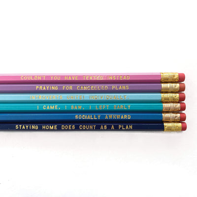 A package of 6 # 2 hex pencils with cheeky introverted sayings imprinted in gold foil