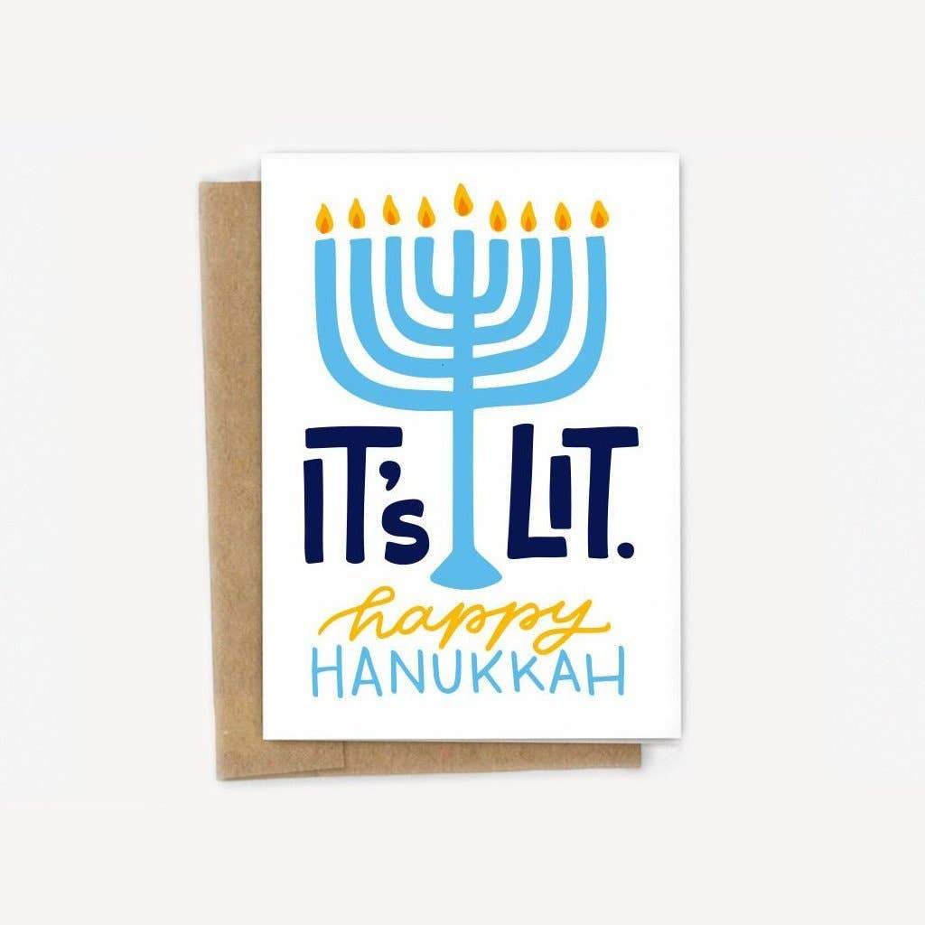 Say happy holidays with this it's Lit Happy Hanukkah greeting card - a white card with an image of an menorah and the words 'it's lit, happy Hanukkah'
