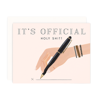 A greeting card set on cream colored card stock with an image of a hand holding a pen and applying a signature to a signature field and the words 'it's official, holy s#!t' printed above