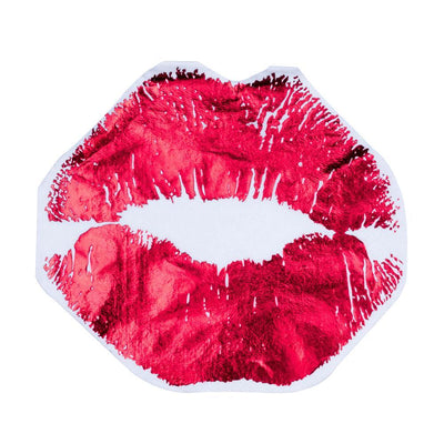 A napkin in the shape of lips with a large lipstick looking mark