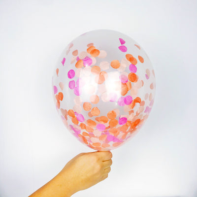 Confetti Balloons - a clear high quality latex biodegradable balloon filled with orange sherbert confetti that is so much fun.