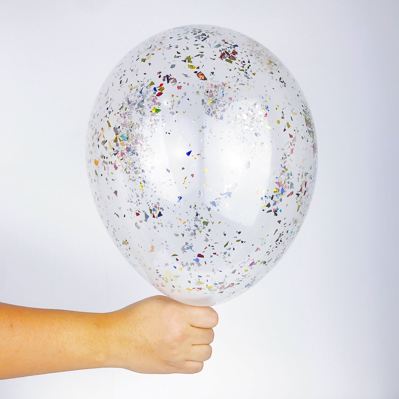 Stardust Confetti Balloon - a clear balloon made of high quality biodegradable latex material filled with finely cut foils in a range of colors