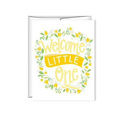A white baby shower greeting card with floral designs of green and yellow with the text 'Welcome Little One' centered on the face of the card.